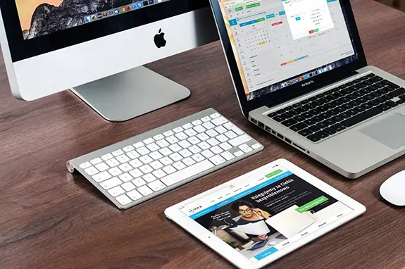 A collection of digital technology on a desk